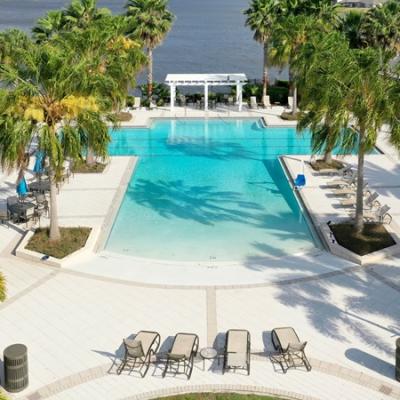 Swimming pool with covered cabanas