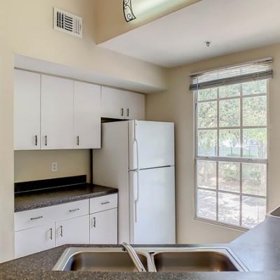 Kitchen with breakfast bar and closet pantry