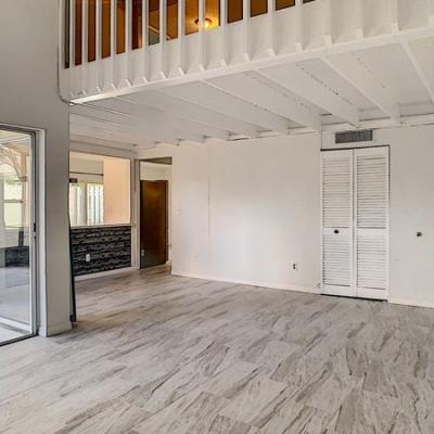 Living room with vaulted ceilings 