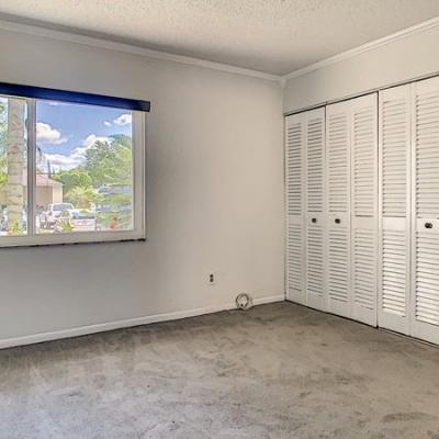 Bedroom with walk-in closet